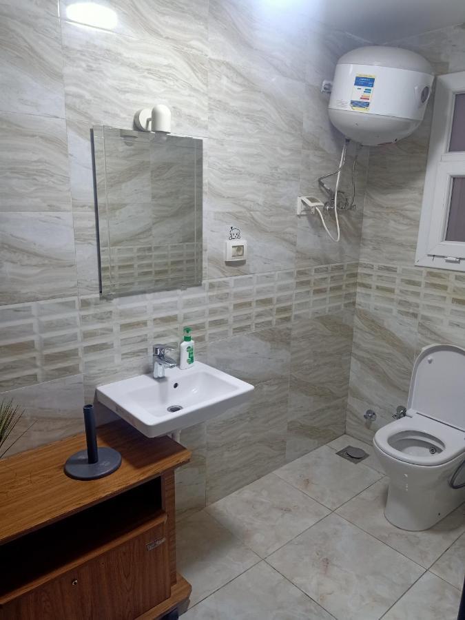 Fully Furnished Apartment At Ocean Blue Compound Caïro Buitenkant foto